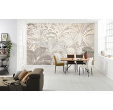 Woonkamer met fotobehang met plantenmotief, eettafel en bank