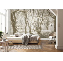 Overzicht van een slaapkamer met fotobehang, bed en stoel