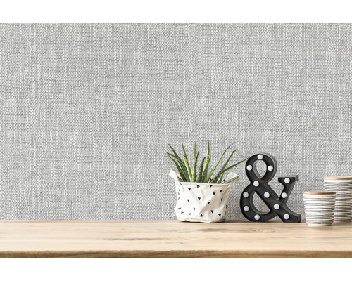 Behang met textielstructuur op een muur