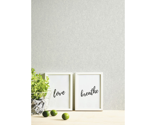 Decoratieve wanddecoratie met de woorden liefde en ademen in fotolijsten