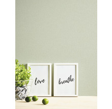 Decoratieve wanddecoratie met afbeeldingen, plant en limoenen