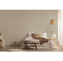 Slaapkamer met gestructureerd, geometrisch behang