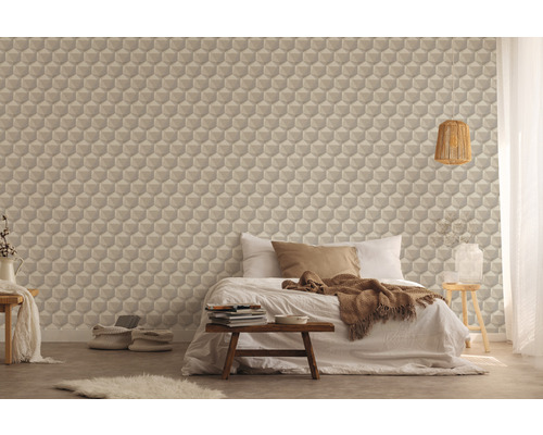 Slaapkamer met gestructureerd, geometrisch behang