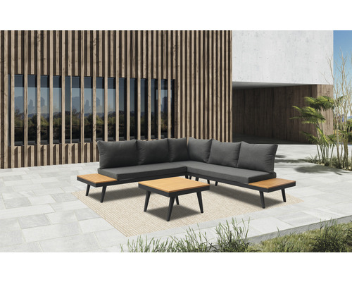 Tuin loungeset met kussens en tafel op terras