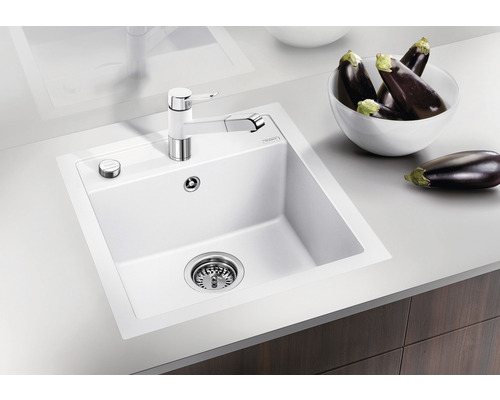 Granieten spoelbak met afdruiprek en kraan