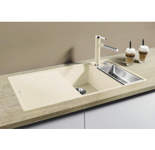 Spoelbak met afdruipvlak en roestvrijstalen spoelbak op een werkblad