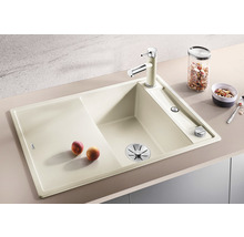 Beige gootsteen met afdruiprek en kraan