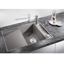 Spoelbak met afdruiprek, kraan en zeepdispenser op een werkblad