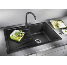 Spoelbak van composiet met afdruiprek en keukenkraan