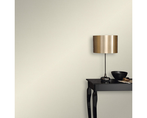 Wandontwerp met tafel en lamp.