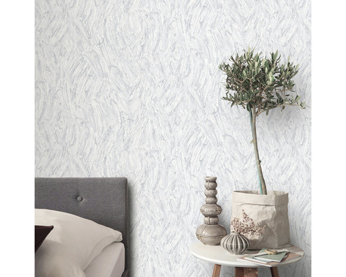 Scène met gestructureerd behang, bed en decoratie