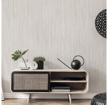 Woonkamer met modern dressoir van hout en rotan