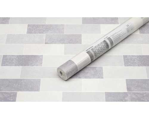 Rol keramische wandbekleding op steenbehang