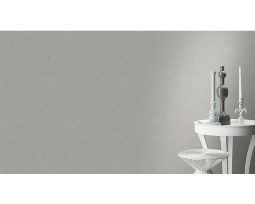 Decoratief behang met een fijne textuur op een wand