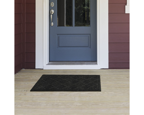 Deurmat voor een voordeur op een veranda