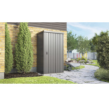 Metalen tuinkast voor een huis met tuin