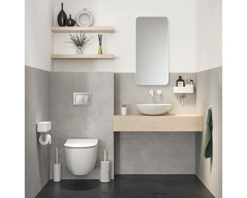 Moderne badkamer met hangtoilet, opzetwastafel en minimalistisch design