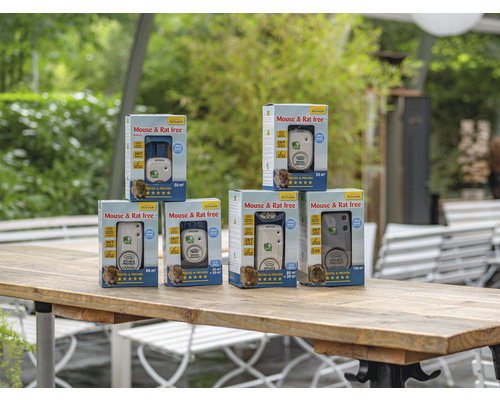 Meerdere verpakkingen EcoShuttle Muis- en Ratvrij op een houten tafel