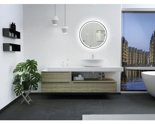 Moderne badkamer met wastafel, spiegel en planten