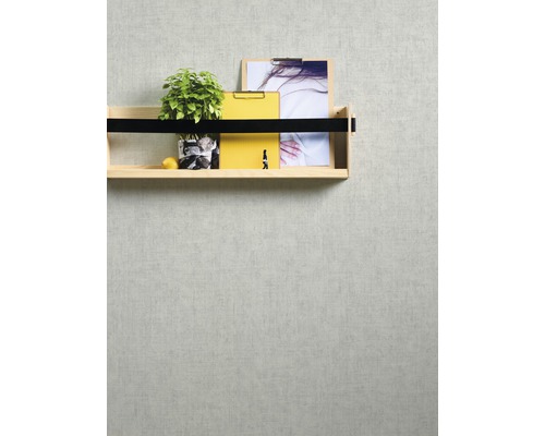 Wandplank met plant, citroen, klemborden en afbeeldingen aan de muur