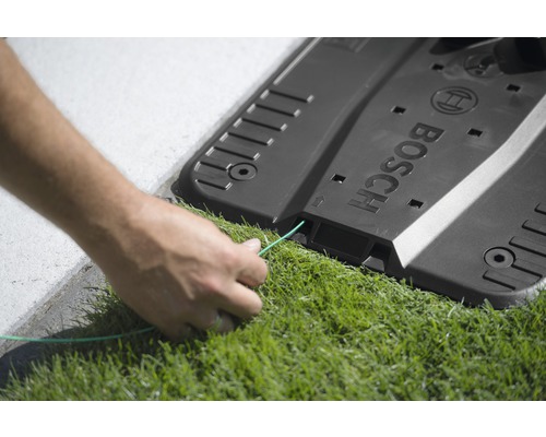 Installatie van een laadstation voor een Bosch robotmaaier