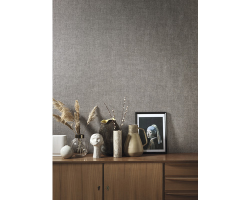 Kamerweergave met textielbehang en decoratie