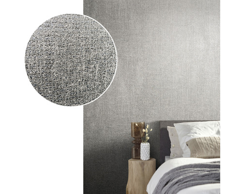 Woonkameropstelling met grijs vliesbehang met linnenlook en detailweergave