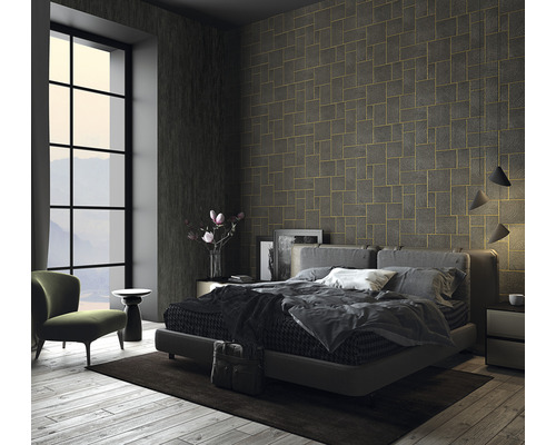 Slaapkamer met gestructureerd behang, bed en zithoek