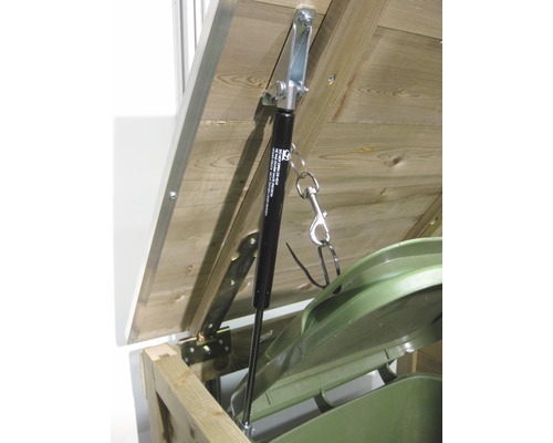 Detailopname van een deksel van een afvalcontainer met gasveer