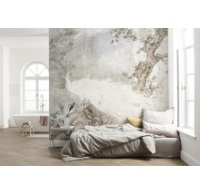 Slaapkamer met behang met pauwenmotief