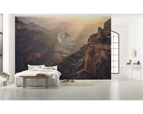 Slaapkamer met fotobehang van een canyonlandschap
