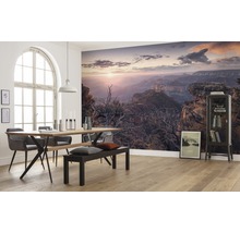 Woonkamer met fotobehang Grand Canyon bij zonsopgang, eettafel en vitrine