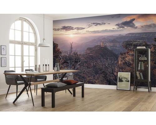 Woonkamer met fotobehang Grand Canyon bij zonsopgang, eettafel en vitrine
