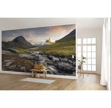 Woonkamer met fotobehang van een berglandschap
