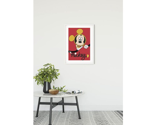 Ingelijste Mickey Mouse poster aan de muur