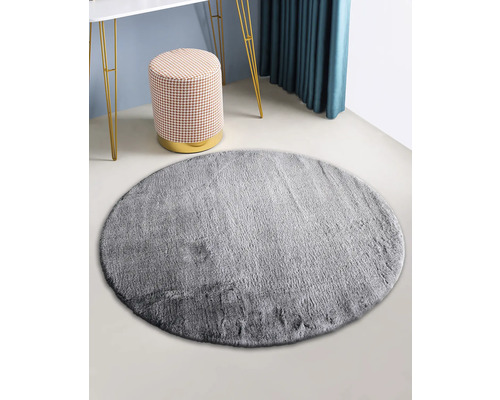 Grijze ronde vloerkleed in kamer