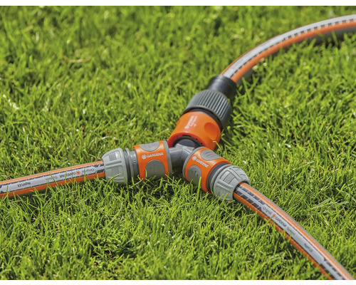 Tuinslangsplitter op gazon