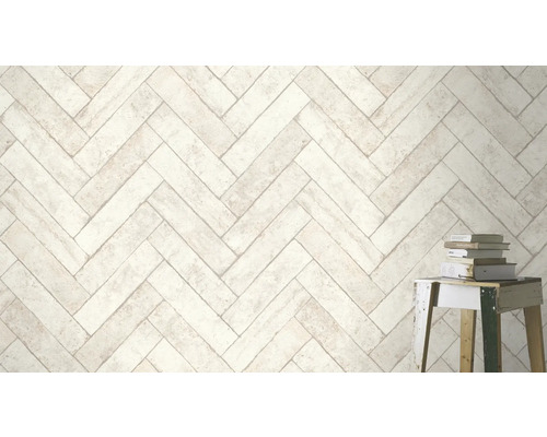 Lichte wandtegels in visgraatmotief