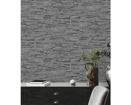 Grijze behang met steenlook in interieur