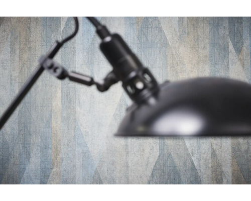 Close-up van een lamp voor een wand met patroon