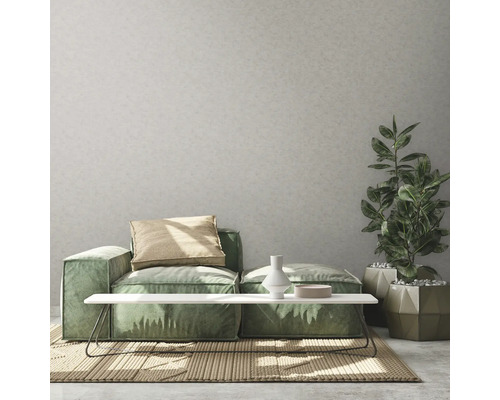 Woonkamer met modulaire bank, bijzettafel, kamerplant en vloerkleed