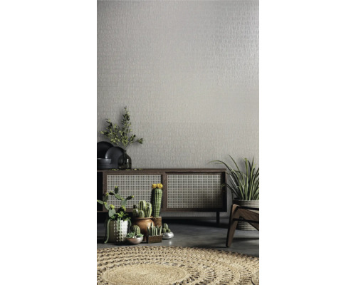 Woonkamerontwerp met dressoir, planten en patroonbehang