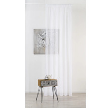 Decoratief interieur met witte, transparante gordijnstof, afbeelding en bijzettafel