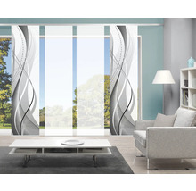 Woonkamer met schuifgordijnen met grafisch design