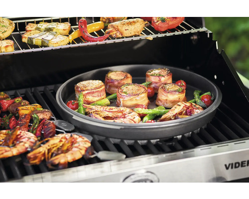 Barbecue met gegrilde gerechten zoals vlees, groenten en zeevruchten