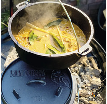 Gietijzeren Dutch Oven met deksel en gerecht