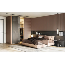 Moderne slaapkamer met bed, schuifdeuren en inloopkast