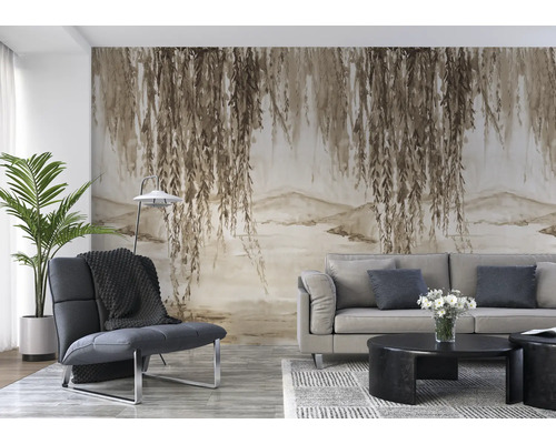 Woonkamer met bank, fauteuil en fotobehang met waterlandschap