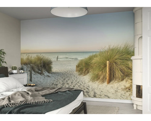 Slaapkamer met fotobehang van een zandstrand
