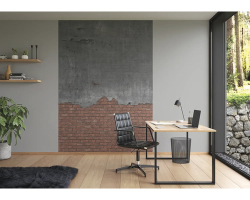 Moderne werkkamer met bureau, bureaustoel en wanddecoratie in baksteenlook